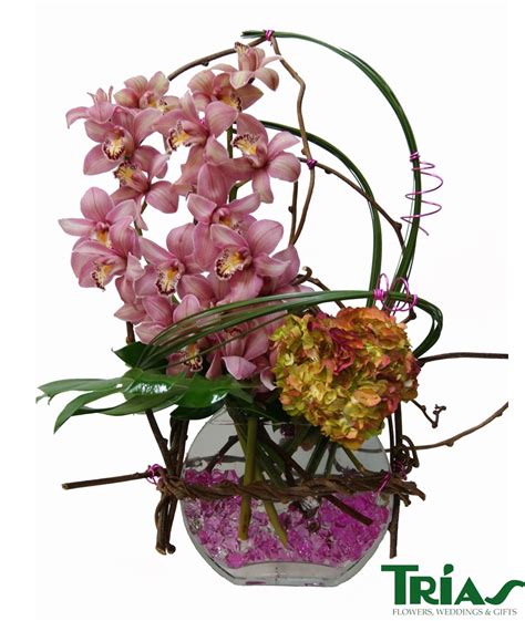 Trias flowers - Trias is a Miami-based florist that offers wedding and event planning, decoration, and gifts. Browse their portfolio of fresh-cut flowers, bouquets, and designs for your special occasion.